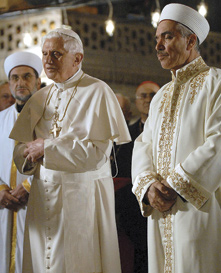 Pope Benedict XVI prays with the grand mufti of Istanbul in the Blue Mosque. Pope Benedict XVI prays with the grand mufti of Istanbul in the Blue Mosque.