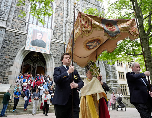 Escorted by Knights, Auxiliary Bishop Juan Miguel Betancourt of Hartford carries the Eucharist in procession from St. Mary’s Church to St. Joseph’s Church in New Haven, Conn., as the Seton Route of the National Eucharistic Pilgrimage begins May 19.