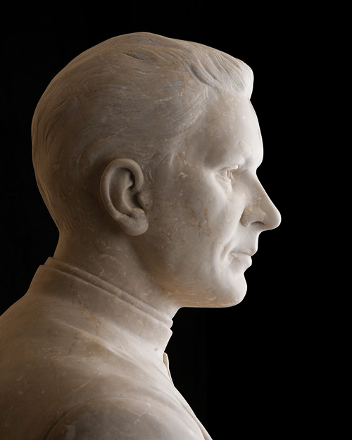 A closeup of the marble statue shows Father McGivney’s profile. (Photo by Paul Haring)