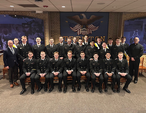 Members of Commodore Barry Council 14534 gather after an exemplification Feb. 8 at the United States Naval Academy in Annapolis, Md. They are joined by their chaplain, U.S. Navy chaplain Father Curtiss Dwyer (right), and their financial secretary, retired Navy Capt. Joe McInerney (left).