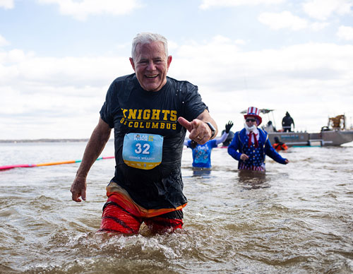 David Lewis, past grand knight of Fort Belvoir (Va.) Council 11170, smiles after plunging into the Potomac River with fellow Knights during the Special Olympics Polar Plunge held at Leesylvania State Park in Prince William, Va., Feb. 17. (Courtesy of Special Olympics Virginia)