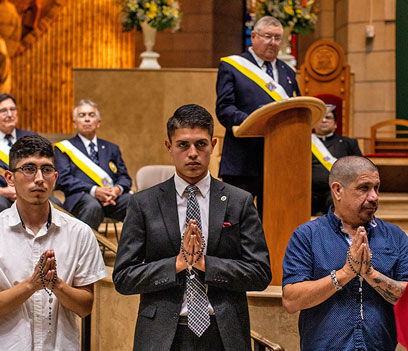 Men in San Juan, Texas, join the Knights of Columbus at an exemplification ceremony in the Basilica of Our Lady of San Juan Del Valle