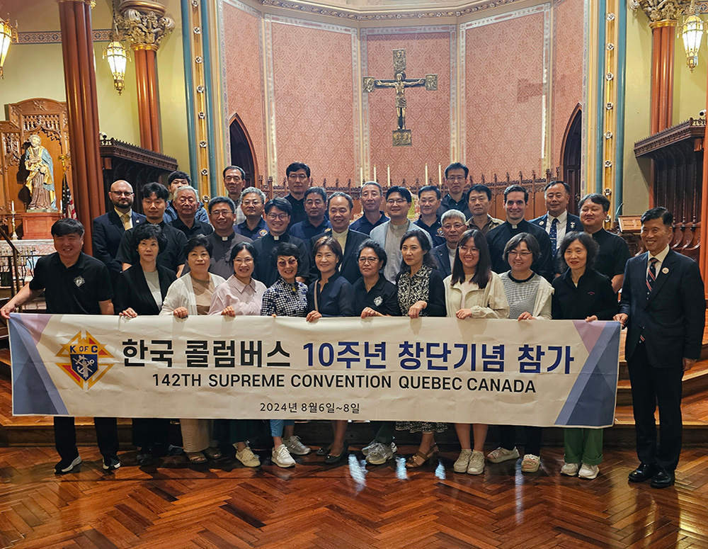 Korean Knights and family members visit St. Mary’s Church in New Haven, Conn., Aug. 10, during a pilgrimage following the 142nd Supreme Convention in Québec City. 